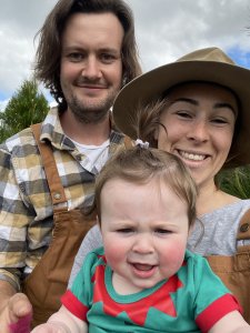 Family at the Christmas tree farm